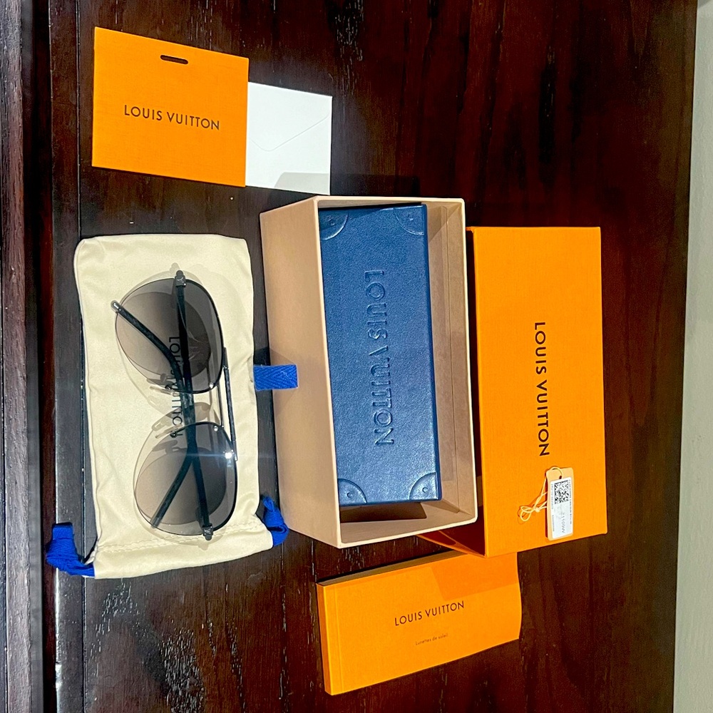 LOUIS VUITTON Clockwise Canvas Sunglasses retails for $800